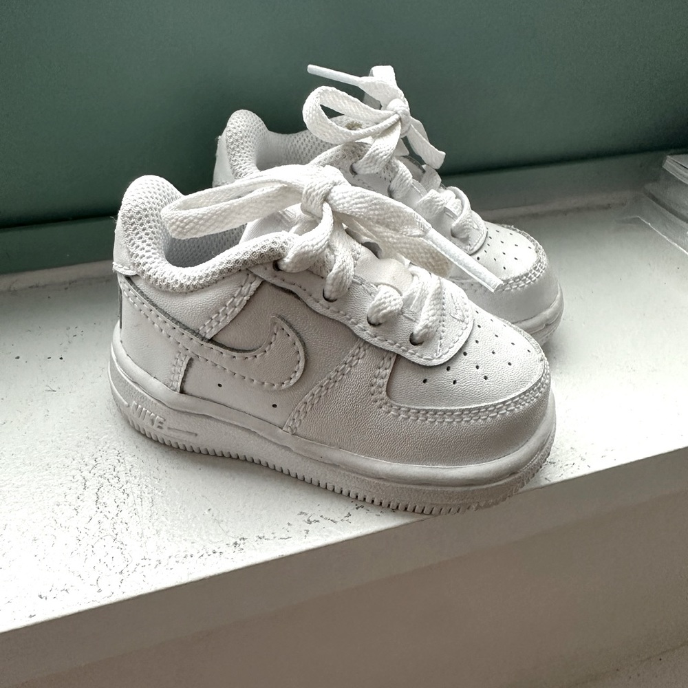 Baby Nike white shoes